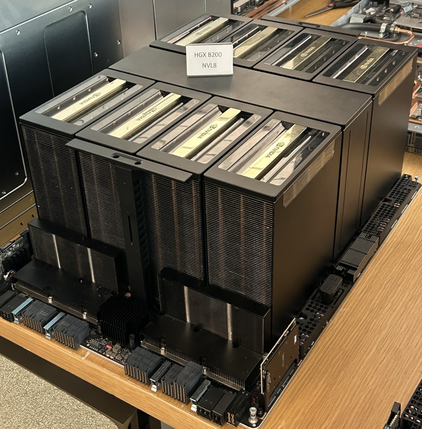 NVIDIA HGX B200 baseboard · 8 Blackwell GPUs + NVLink Switch